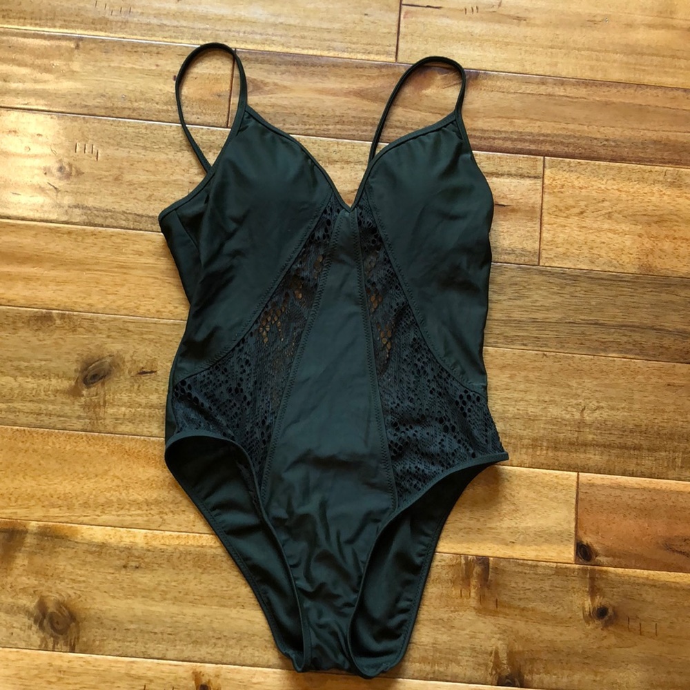 Green one piece bathing suit with net/lace